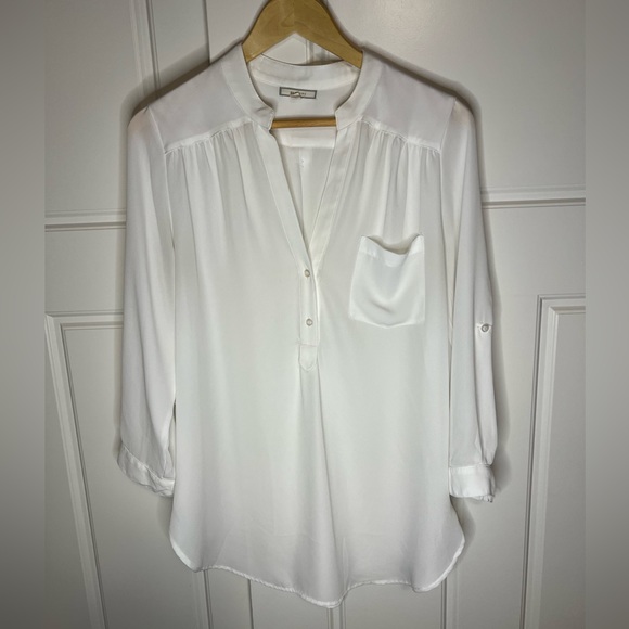 White, v-neck, Pleione top. Relaxed fit, tunic length with adjustable sleeves. - Picture 9 of 9